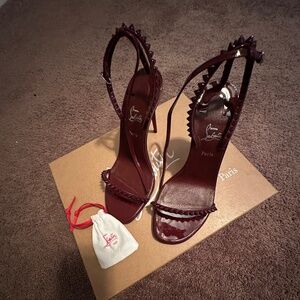 Christian Louboutin Spike Red Bottoms (size 36.5)